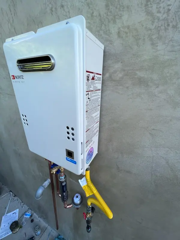 Tankless water heater installation for Green Camp homes